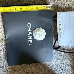 Chanel Black Bag with White Camellia